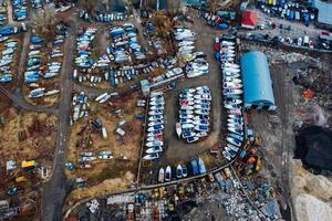 Aerial view of boat yard on land. Stored ships during winter time photo