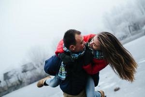 Young beautiful couple having fun photo