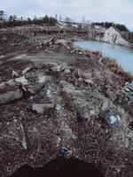 Beautiful quarry, the lake is covered with ice photo