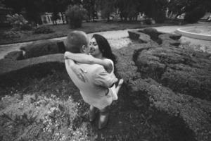 European Young couple hugging on the background of a beautiful building photo