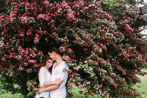 Young happy couple in love outdoors photo