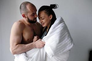 man and woman in the bedroom photo