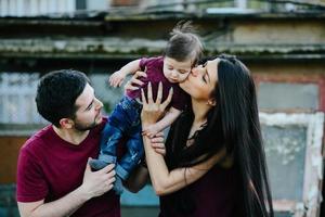 young family with a child on the nature photo