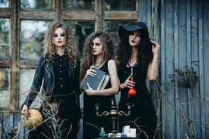 three vintage women as witches photo