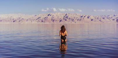 Young woman going to Dead Sea, Israel photo
