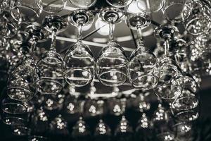 Beautiful chandelier made with glasses of wine photo