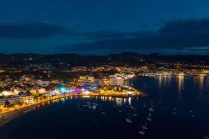 Beautiful aerial view on coast of the night city photo