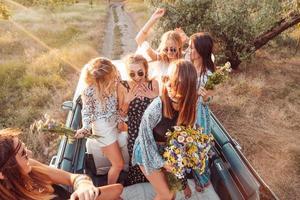 Six girls have fun in the countryside photo