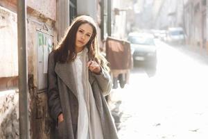 Woman walking in the old town. photo