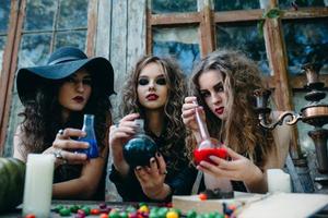 three witches at the table photo