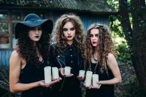 three vintage women as witches photo