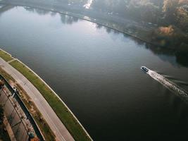 Motor boat floats down the river Wisla photo