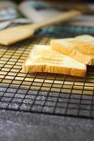 2 freshly made toasts laid out and ready to serve on the table. photo