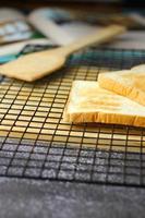 2 freshly made toasts laid out and ready to serve on the table. photo