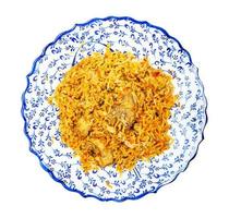 top view of Chicken biryani on plate isolated photo