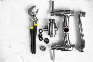 top view of wrench, faucet, spout with copyspace photo