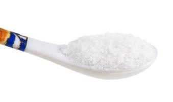 view of chinese spoon with fine Sea Salt close up photo