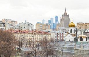 Moscow skyline with cathedral and skyscraper photo