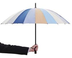 male hand hold open multicolored umbrella photo