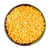 raw whole red lentils in round bowl isolated photo
