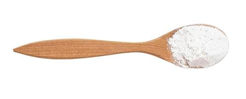 top view of vanilla sugar in wood spoon isolated photo