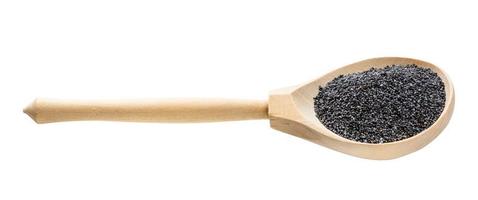 wooden spoon with poppy seed isolated on white photo