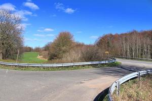 Beautiful view on countryside roads with fields and trees in northern europe photo