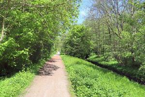 Beautiful view on countryside roads with fields and trees in northern europe photo