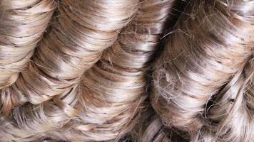 Close-up shot of thick stacked  bundles of Dry Jute fiber Texture Background video