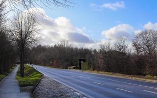 Beautiful view on countryside roads with fields and trees in northern europe photo