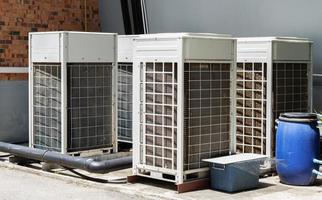 Large compressors air conditioners of office building photo
