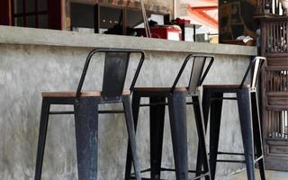 Black steel bar stool with counter bar photo