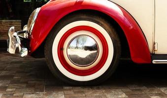 Close up wheel red retro car photo