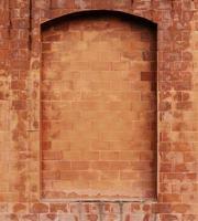 fondo de pared de ladrillo antiguo naranja con pared de bloque en blanco para imagen publicitaria. foto