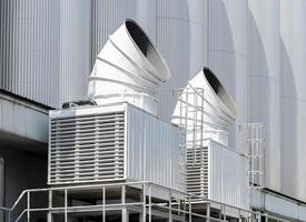 Cooling water tower on rooftop industry plant photo