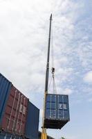 Crane lifting up container loading photo