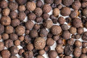 background - allspice jamaica peppercorns photo