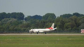 DUSSELDORF, GERMANY JULY 23, 2017 - Saab 2000 Swedish passenger turboprop aircraft speed up before takeoff from Dusseldorf airport. Tourism and aviation concept video