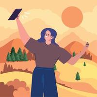 mujer tomándose una selfie en el campamento vector