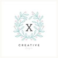 Luxury floral logo letter X for Beauty Cosmetic business, wedding invitation, boutique and other company vector