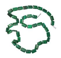 coiled string of beads from artificial malachite photo