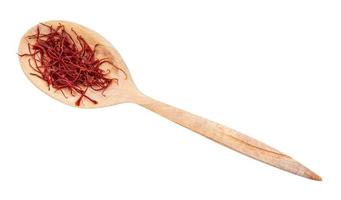 top view of crocus saffron threads in wood spoon photo