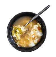 top view of stelline and vegetable soup with spoon photo