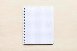 blank sheet of squared paper of spiral notebook photo