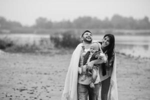 Young family with a little boy to have fun photo