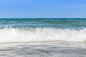 Wave on the sea coast line photo
