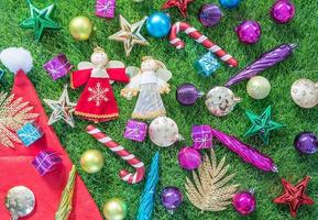 Top view Christmas decoration on green grass photo