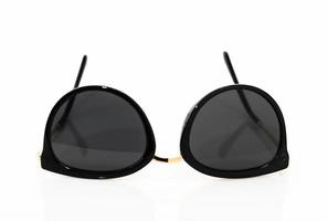 Black sunglasses on white photo