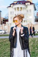 beautiful girl in a leather jacket photo