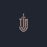 monograma de logotipo tm con plantilla de diseño de estilo espada y escudo vector